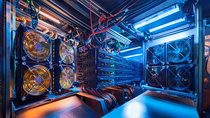 Crypto mining setup with multiple GPUs and cooling fans in operation, highlighting the high-tech infrastructure of cryptocurrency mining.